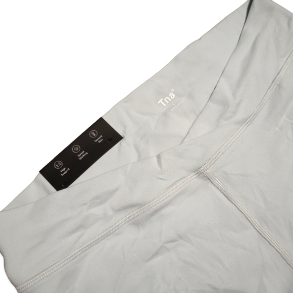 New TNA Hot Cross Leggings Size Large Butter Leggings Mirror Blue Tights - Picture 2 of 11